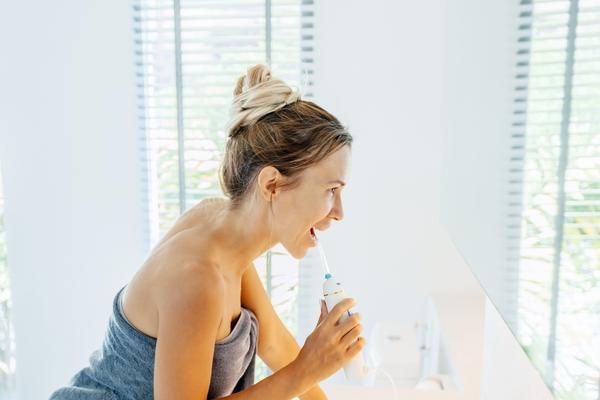 Flossing Properly with Dental Implants - MySmile