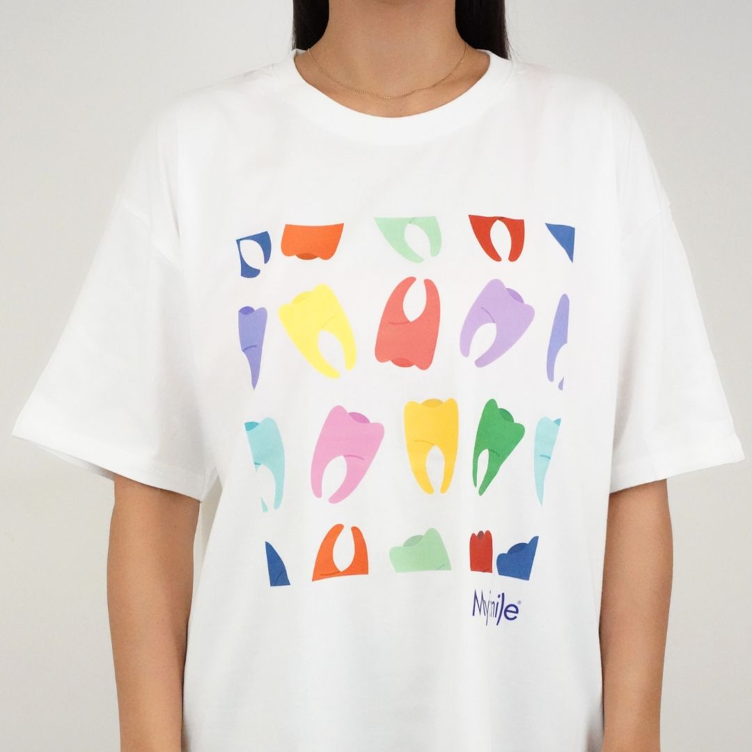 White T-shirt with colorful abstract shapes and the word "Nipple" at the bottom